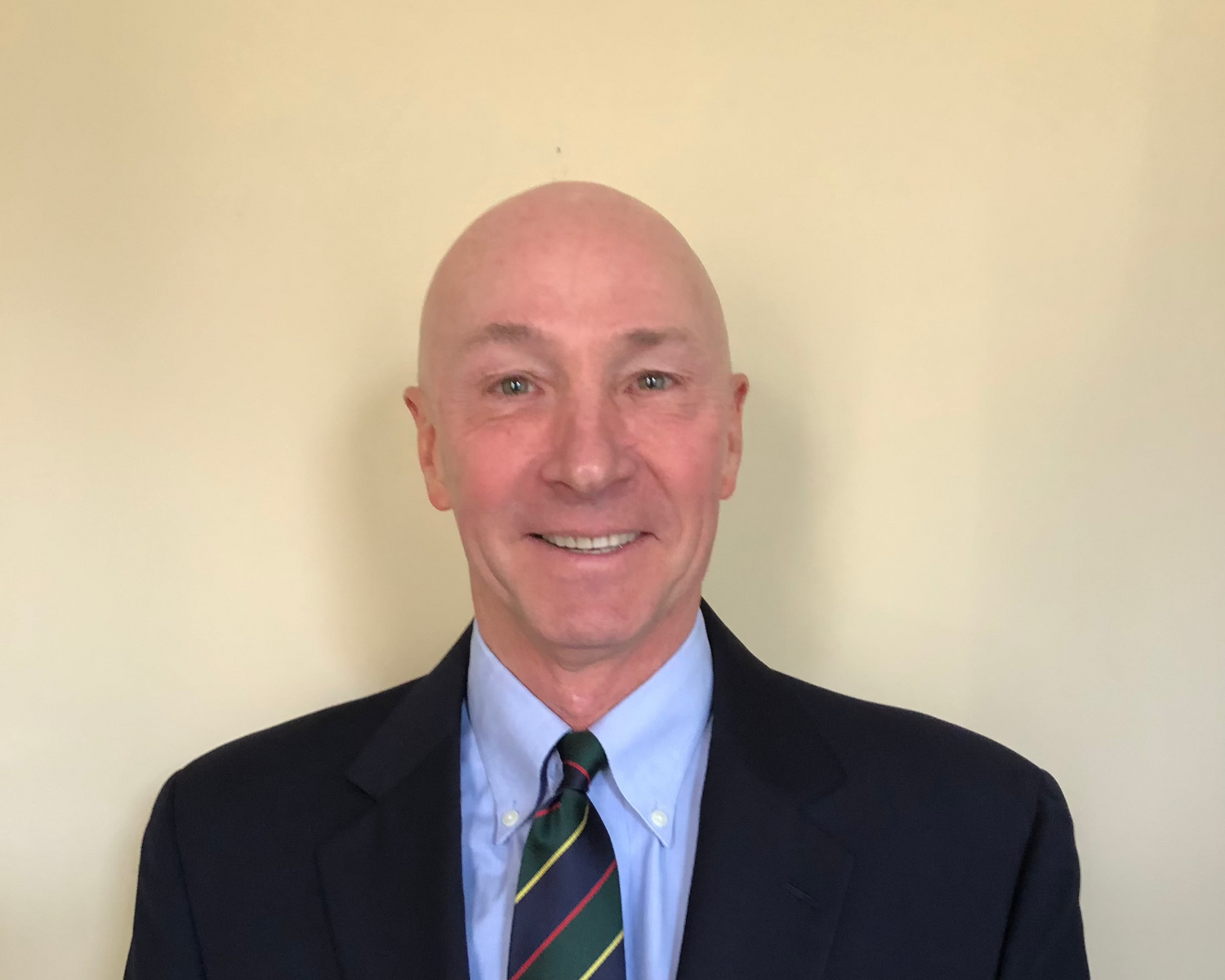 Advisory board member for Marins Inc. in suit and tie against a plain background