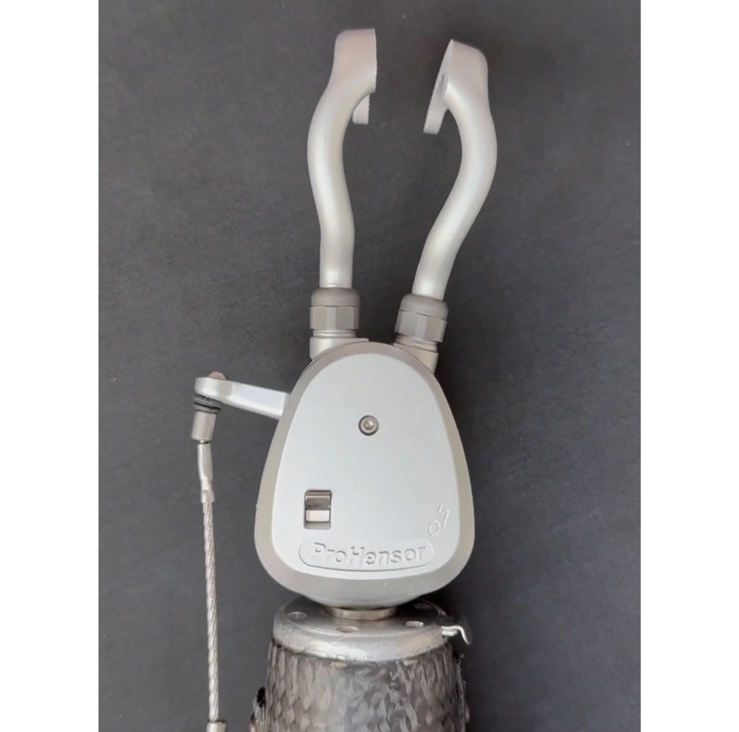ProHensor® voluntary closing and locking terminal device for upper limb amputees on black background.